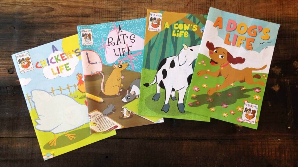 Four PETA Kids comic books about chickens, rats, cows, and dogs