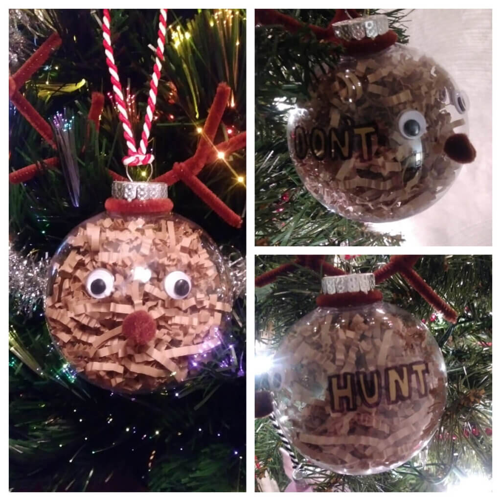 Reindeer ornament with the words "Don't Hunt" written on it.