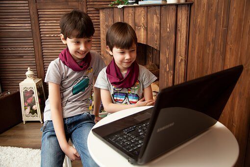 kids in front of a computer