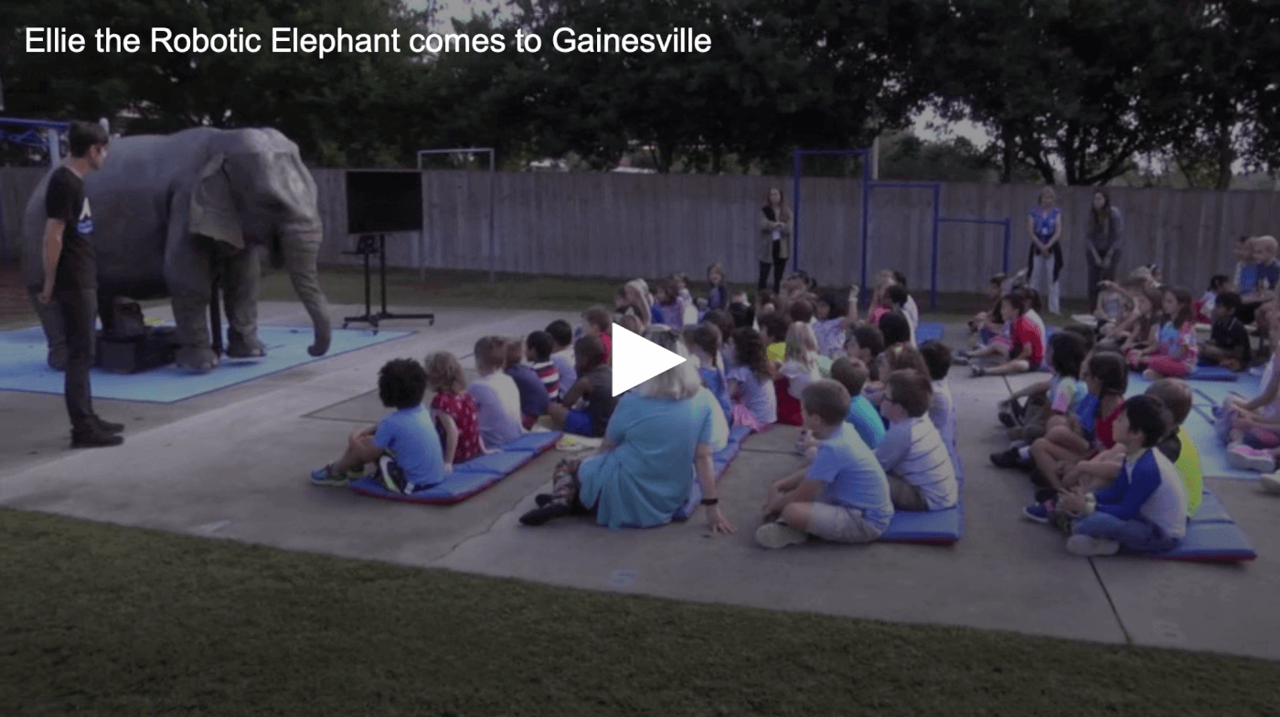 Ellie the elephant talking to students at Millhopper Montessori School in Gainesville, Florida