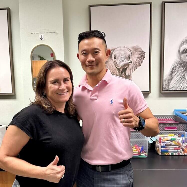 Two teachers smiling