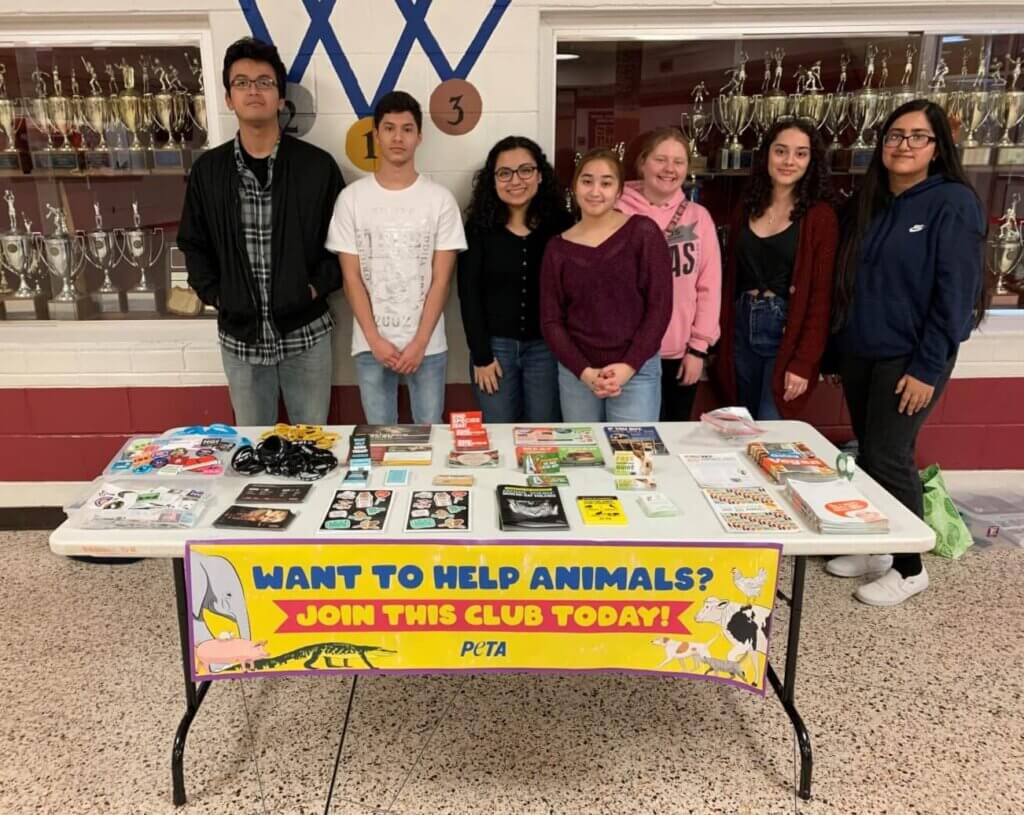 Members of PETA's Students United for Animal Rights program set up a table at Stonewall Jackson High School in Manassas, Virginia, to encourage their peers to join their animal rights club. Are you part of an animal rights club at your school? Join our Students United program for tips, mentors, free monthly action kits, and even rewards like vegan pizza parties.