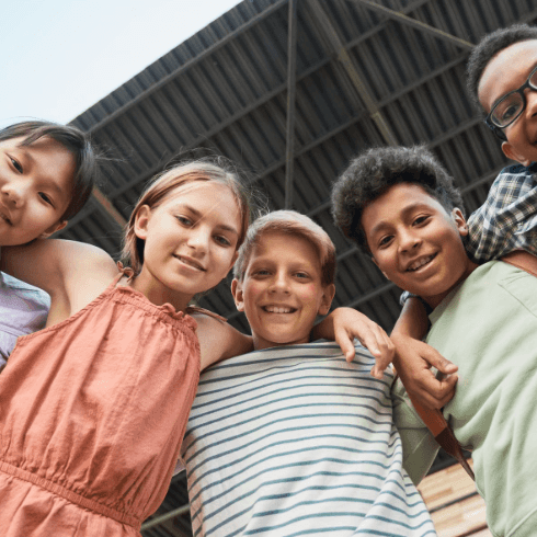 five kids standing together