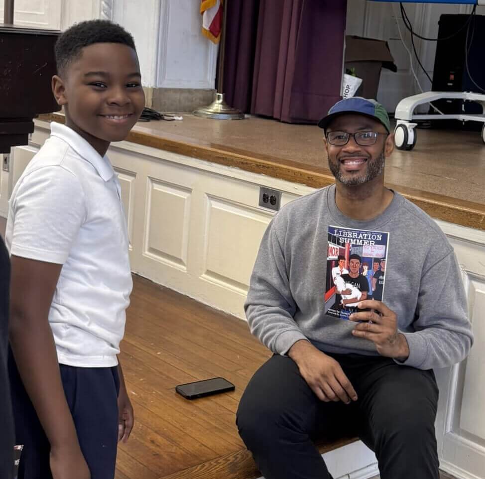 Meet the Author, Stewart with student