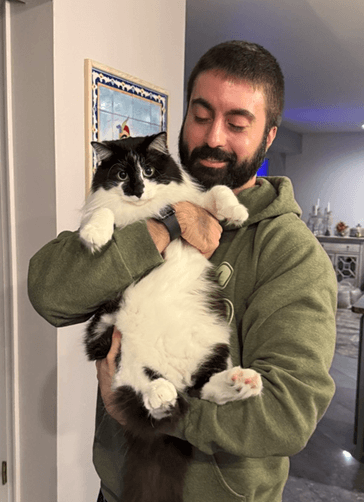 A-list teacher, Mike Tori, with Peanut the cat